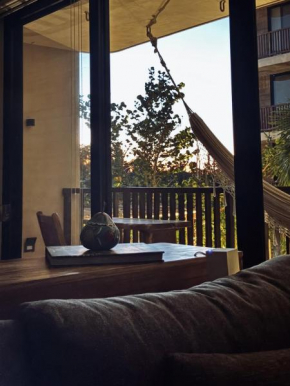 Artistic Loft Steps from the Beach with Pool View